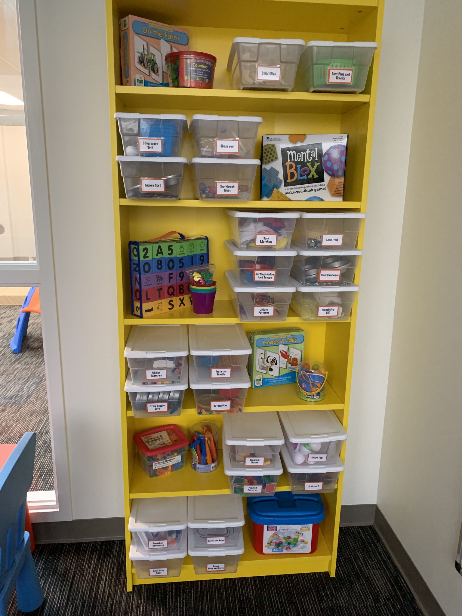 Puzzle and activity shelf